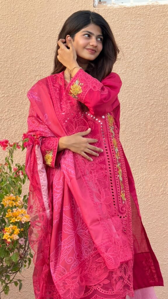 “Wrapped in tradition, painted in pink. Grace isn’t something you wear — it’s something you carry.”